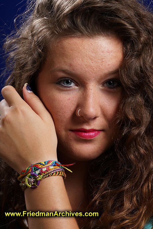 teenager,girl,bracelet,nose ring,lipstick,friendship,lanyard,head shot,